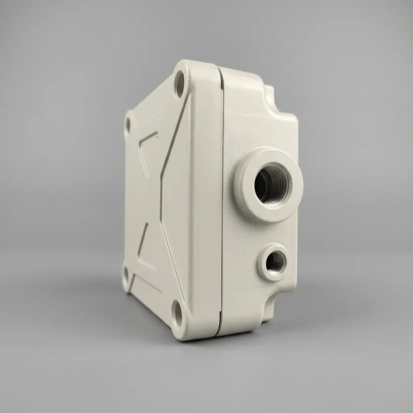 CNC actuator housing with precision mounting features